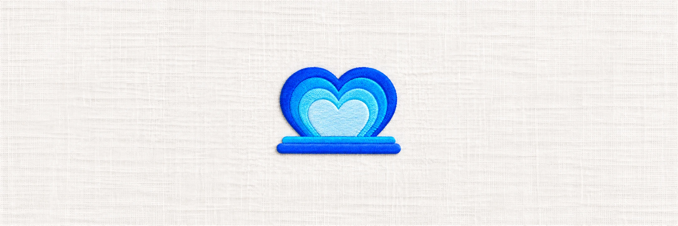 Lunest’s blue emblem embroidered on white woven fabric